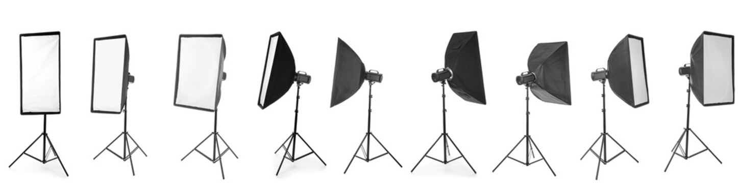 Professional photography studio softbox lighting equipment collection on white background for commercial photo shoots, various sizes and shapes of softboxes, including rectangular and octagonal