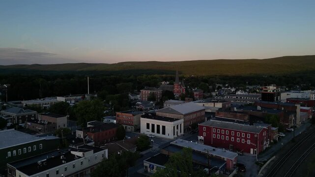 view of port jervis downtown church aerial (small town village new york new jersey pennsylvania tri state line border) delaware river city urban commercial district