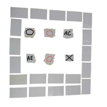 Chess pieces set on chessboard with letters and numbers
