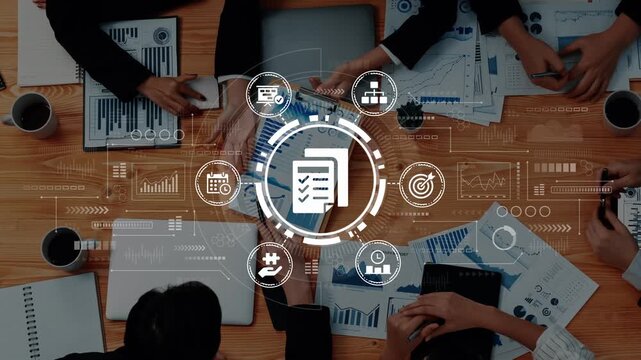 A dynamic business meeting showcasing teamwork and strategy planning with digital tools, data analysis, and collaborative discussions in a professional environment. Entropy.