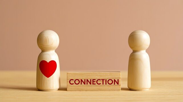 Connection concept with wooden figures and heart symbol representing relationships