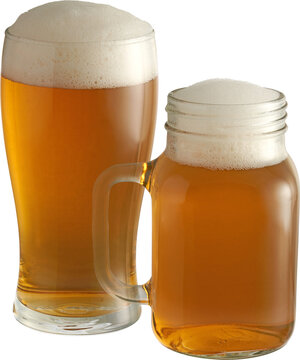 Two glasses of amber beer side view isolated on transparent background