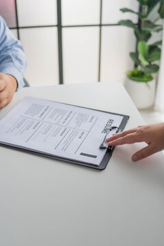 Asian businesswoman sent resume for apply for work