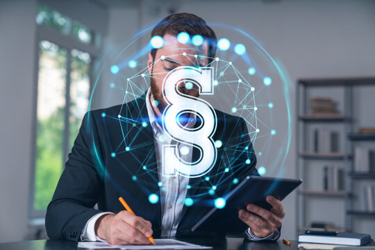Considered businessman in formal wear signing contract holding tablet device at office room with papers. Concept of successful business deal, agreement, partnership, documents. Legal and law icons.
