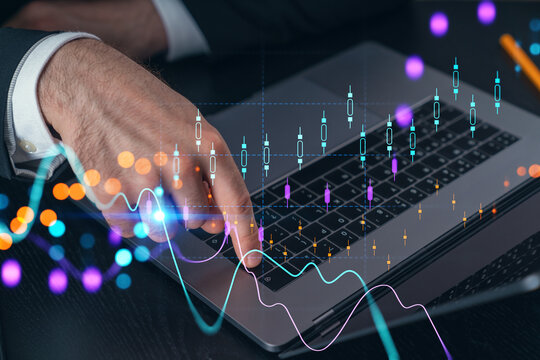 Woman typing on laptop at office workplace in background. Concept of working process, internet surfing, online business education. Student send e-mail. Close up view. Hands Shot. Stock market chart