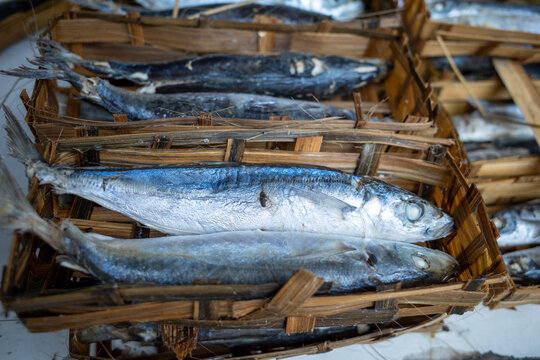 Ikan Pindang or salted fish in bamboo packaging on traditional market, in Yogyakarta, Indonesia