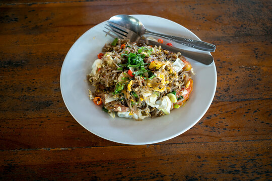 Mie Lethek, Bakmi Goreng, an Indonesian traditional street food, fried noodles cooked with spices typical of Javanese cuisine