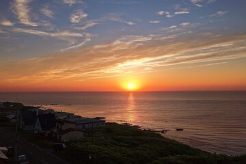 Obraz premium Aerial drone photo of sunset over the Sea of Japan from Yagishiri Island, Hokkaido