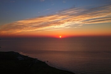 Fototapeta premium Aerial drone photo of sunset over the sea from Yagishiri Island, Hokkaido, Japan