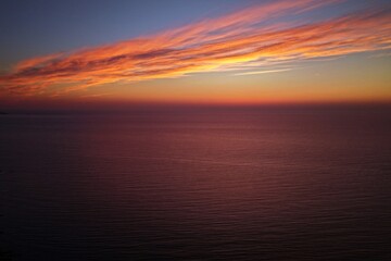 Obraz premium Aerial drone photo of sunset over the sea between Yagishiri and Teuri Island, Hokkaido, Japan