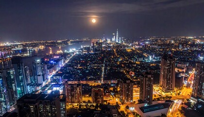 Fototapeta premium Glowing cityscape at night, lights ablaze under a large, bright moon in the sky