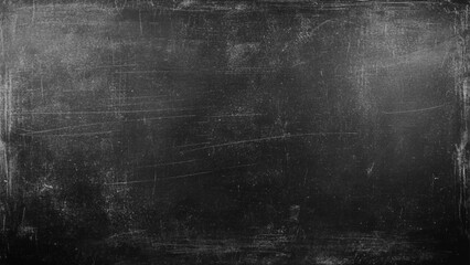 Fototapeta premium Heavy-duty industrial texture in charcoal grey and deep black. High-contrast white scratches, scuffs, abrasions cover the surface, authentic worn metal or chalkboard effect, grunge distressed backgrou