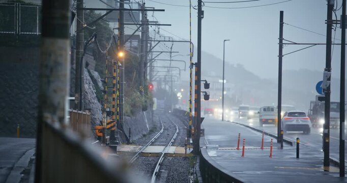 Beautiful, misty rain storm on tracks in Japan