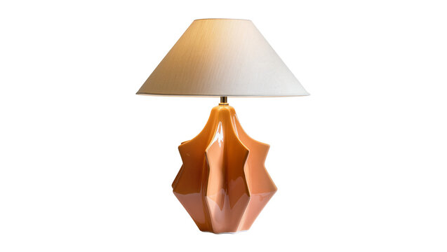 Orange faceted ceramic table lamp with white conical shade, isolated on transparent background