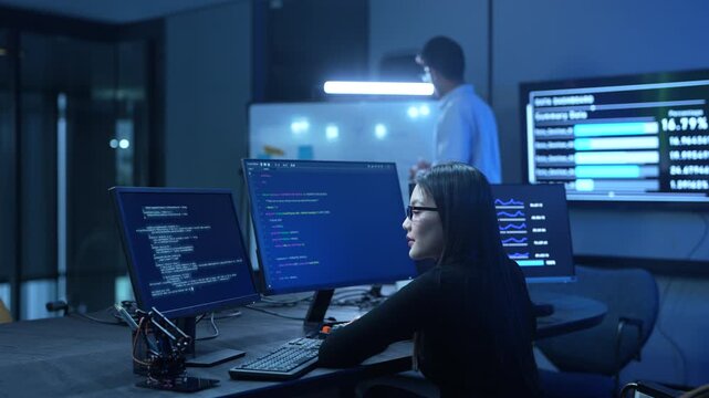 Programmer professional female working on software development, Asian IT developer coding for SaaS platform and cybersecurity network, Modern technology and computer programming business concept