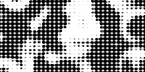 Fototapeta premium Dotted halftone gradient texture. Fading polka dot background. Repeated dots gradation pattern. Black vanishing comic pop art overlay backdrop. Halftone raster effect wallpaper. Vector Ilustration