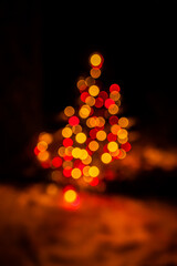 Obraz premium Twinkling lights dance in the night, creating a warm holiday atmosphere filled with joy