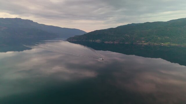 Lone Boat on Mirror Calm &Aring;krafjorden near Langfossen Waterfall, Norway