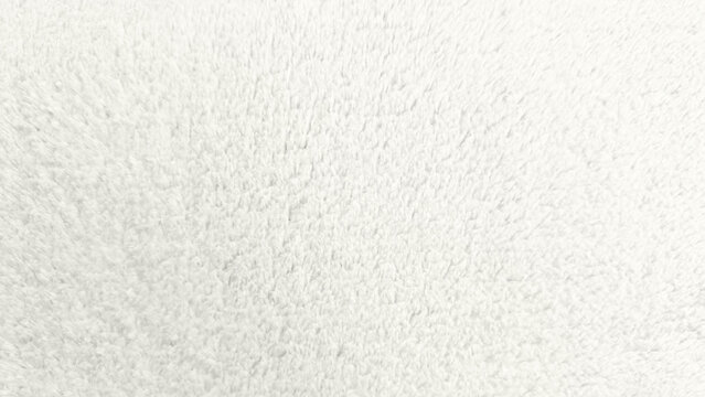 soft off white plush fleece fabric texture background showing cozy fleece material with soft lighting