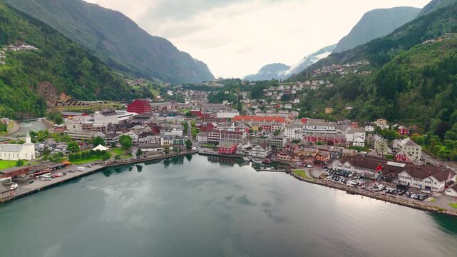 Aerial Drone View of Odda Town Surrounded by Mountains and Fjords, Norway