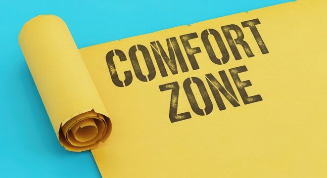 Stepping out of comfort zone concept with yellow paper note