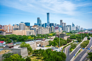 Obraz premium The skyline of Beijing CBD and the scenery of the Ming Dynasty city wall