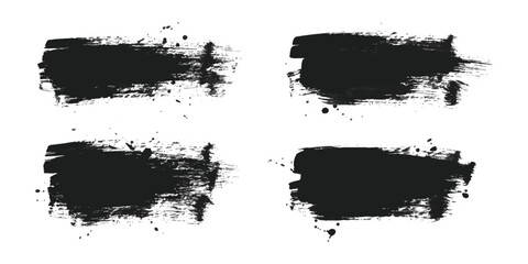 Fototapeta premium Set of four black ink brush strokes with messy texture and paint splatter marks for artistic design projects