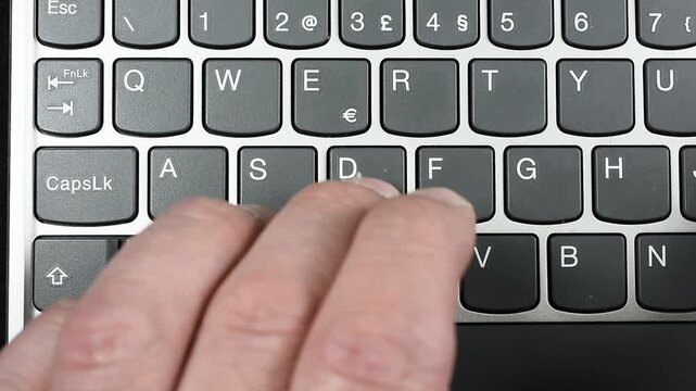 Fingers Typing on Computer Top View