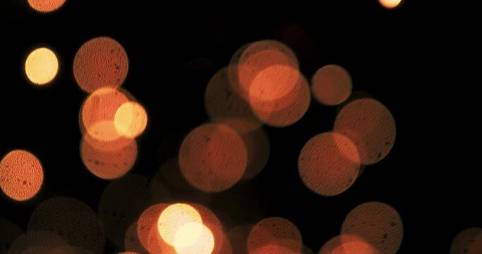 Experience a stunning video of shimmering metal sparkles dancing on a luxurious black background, perfect for enhancing motion graphics and essential for all your creative projects