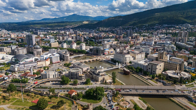 drone Aerial of Skopje city center with the Vardar river, against Vodno mountain, North Macedonia capital city