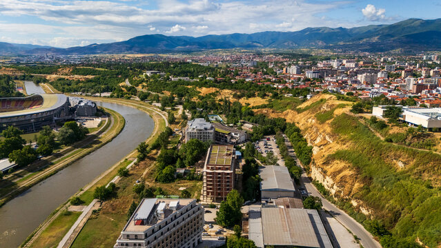 drone Aerial of Skopje city center with the Vardar river, against Vodno mountain, North Macedonia capital city