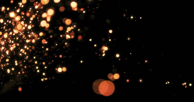 The sparkling metal and luminous particles shine against a dark background, perfect for motion graphics and special effects, enhancing creativity and appeal in various design projects