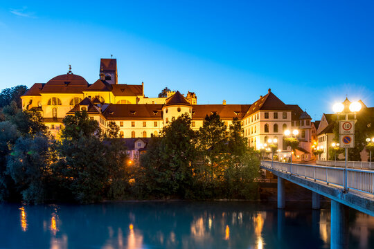 St. Mang Abbey by the river Lech at blue hour in Fussen