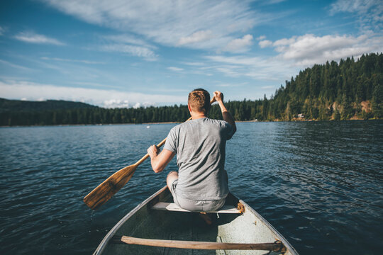 Canada, British Columbia, man in canoe on Cultus Lake