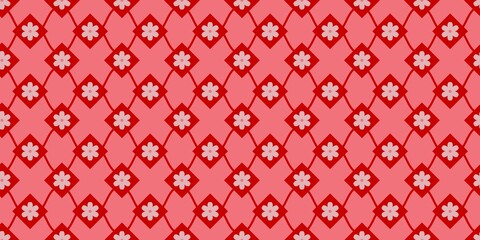 Fototapeta premium Seamless geometric pattern with red diamond shapes, wavy lines, and small pink flowers on a coral background. Ideal for textiles, wallpaper, wrapping paper, and festive backgrounds.