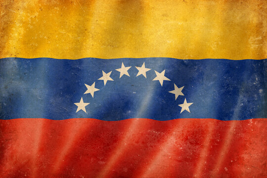 Old vintage flag of Venezuela, worn and stained