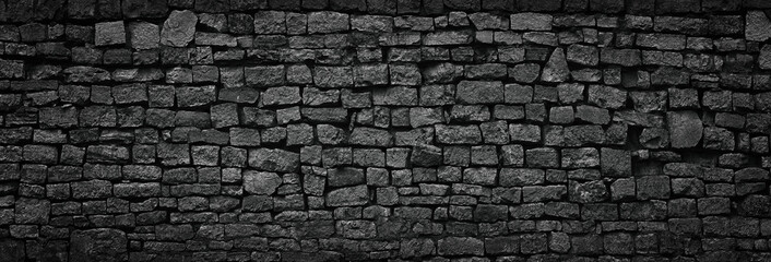 black stone wall an old castle, dark background of slate bricks © dmitr1ch