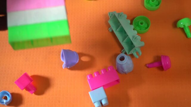 Colorful interlocking plastic building blocks for educational play, creativity development, problem-solving skills, and imaginative learning activities.