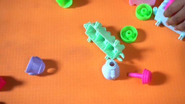 Colorful interlocking plastic building blocks for educational play, creativity development, problem-solving skills, and imaginative learning activities.