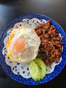 Spicy Thai pad krapow served with rice and fried egg