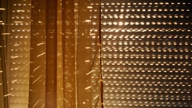 Warm golden sunlight streams through closed window blinds, creating dotted patterns and dramatic shadows across a curtain and interior surfaces, 4K
