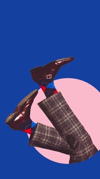 Stop motion stylish legs with bright socks and polished shoes. Concept of fashion detail, quirky office style, menswear accessories, playful identity, and retro business style.