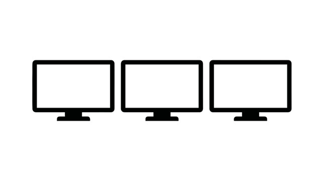 Three black computer monitors with blank white screens