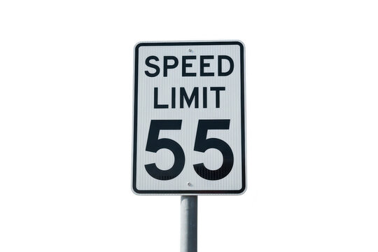 Rectangular white speed limit sign with black text reading 55, mounted on a metal pole, isolated on a solid black background, for traffic