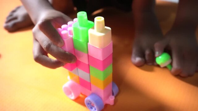 Colorful interlocking plastic building blocks for educational play, creativity development, problem-solving skills, and imaginative learning activities.
