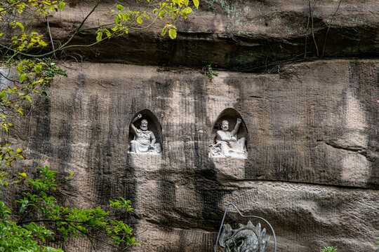 ancient rock-carved Buddha sculptures located at the Jiulongpo District of Chongqing, China, Huayan Temple