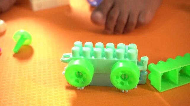 Colorful interlocking plastic building blocks for educational play, creativity development, problem-solving skills, and imaginative learning activities.