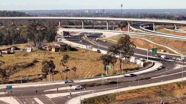 Aerial drone view above the M7 -M12 Interchange at Cecil Hills, Western Sydney, NSW Australia on a sunny morning in June 2026