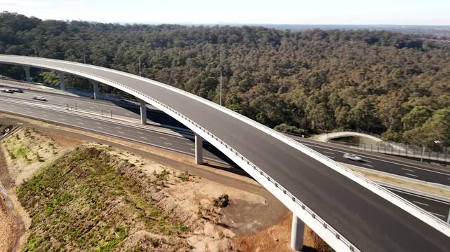 Aerial drone view above the M7 -M12 Interchange at Cecil Hills, Western Sydney, NSW Australia on a sunny morning in June 2026