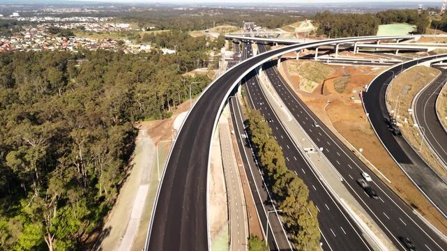 Aerial drone view above the M7 -M12 Interchange at Cecil Hills, Western Sydney, NSW Australia on a sunny morning in June 2026